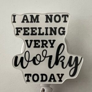 Badge reel: I am not feeling very worky today